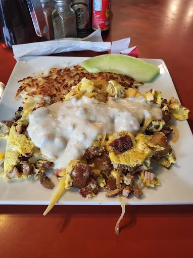 Harley's B.B.B. — ham, bacon, sausage, potatoes and eggs smothered in country gravy
